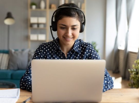 A lady working on her laptop